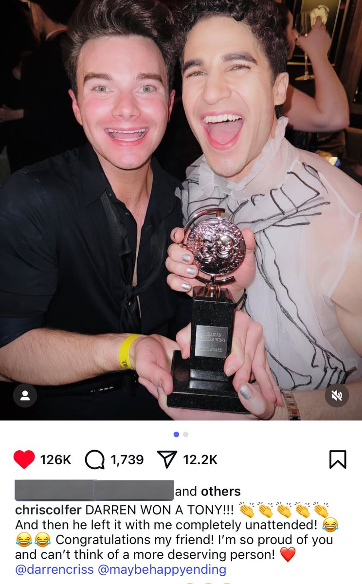 in one direction terms this is like if louis flew to LA and posted a photo on main with harry and also holding his grammy