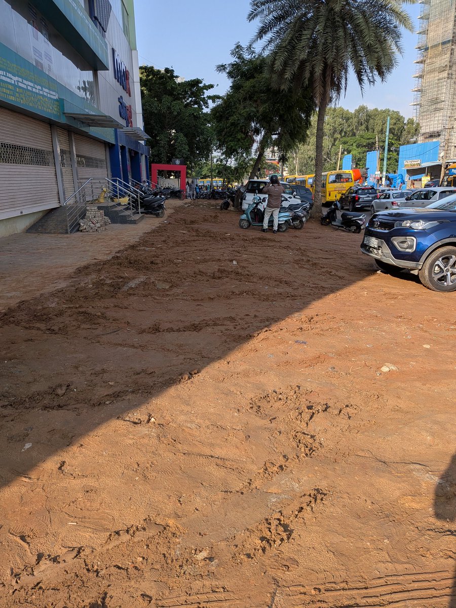 AbrahamByju's tweet photo. Just another day on the "scenic route" to school in Bangalore. Featuring our award-winning pothole collection. Seriously, how much longer will we have to deal with these pathetic road conditions? #BangaloreRoads #PotholeCity #SchoolRunStruggles https://t.co/qhuGzK1M79