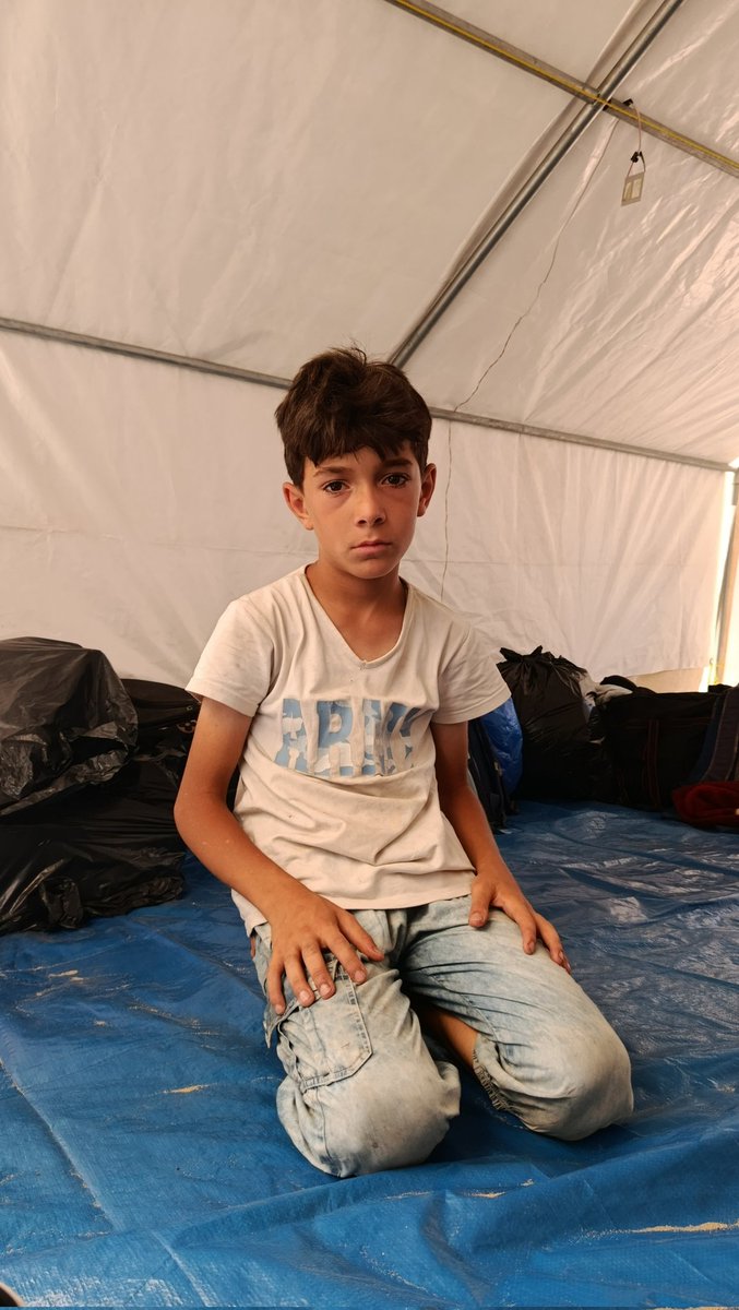 abdalrahma51969's tweet image. In this child’s eyes lie stories of fear and loss. He never played, never laughed like others. War stole his home, his dreams, and left him with a tent for shelter. Cold winters, scorching summers, and silence became his only companions. A stolen childhood, waiting for peace.