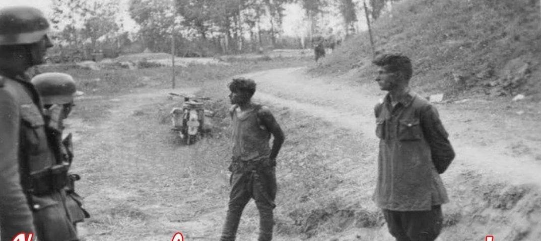 A famous photo taken moments before the execution of two young Russian Soldiers. 

On June 23, 1941,  2 young border guards fought an entire column of German motorcyclists.

They were wounded, captured, and lined up to be shot. But they behaved so calmly and confidently it amazed