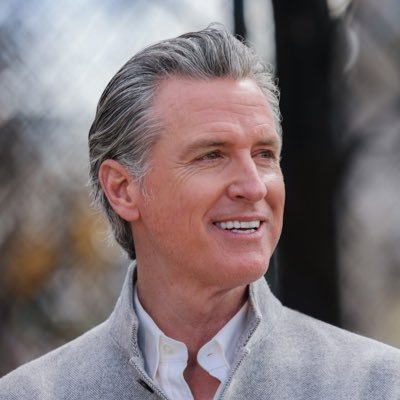 TaraBull's tweet image. Describe Gavin Newsom in a word