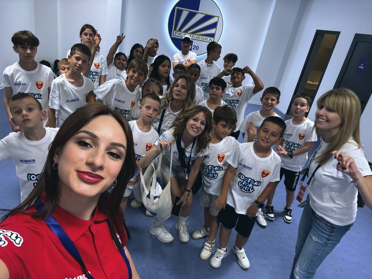 UNHCRMontenegro's tweet photo. ✨ FLASH of Inclusion 
26 refugee &amp; stateless children walked onto the field with 🇲🇪 &amp; 🇦🇲 teams in Nikšić—an emotional finale to our @UEFA supported project with @FudbalskiSavez 
💙This is just the beginning.
Thanks to @GACrnaGora &amp; #DobroDjelo!
#WithRefugees #InclusionThruSport https://t.co/KHft4sVtC1