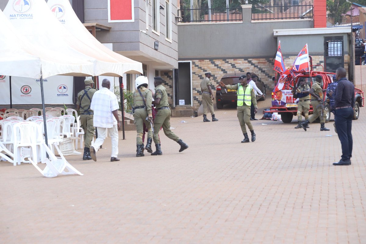 Uganda Police storms NUP headquarters just now, <a href="/PoliceUg/">Uganda Police Force</a>  what is the name of your problem?