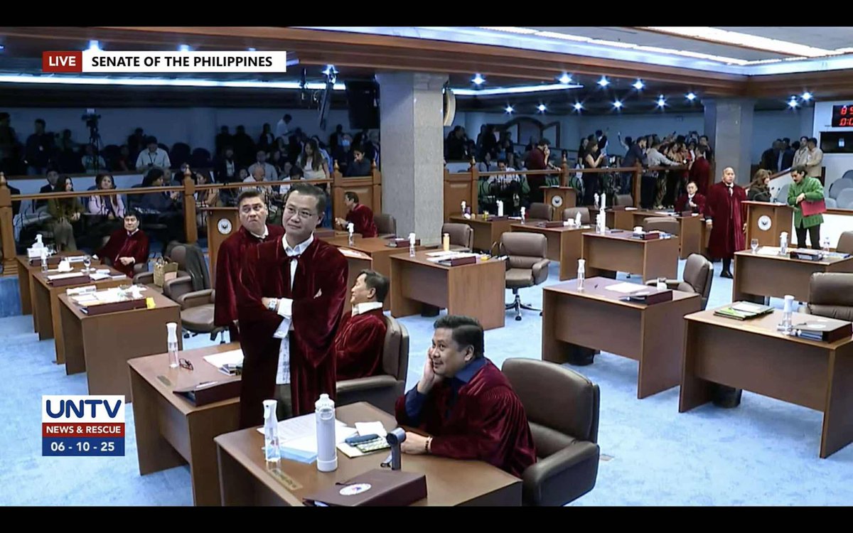 renierbona's tweet photo. It is important to note the demeanors of the senator judges during session suspensions. Their small groups are very telling.

Also, note that @loren_legarda is always on the phone.

Note, too, that @SenImeeMarcos, @Cynthia_Villar, and @tolrobinpadilla are not wearing their robes. https://t.co/GN6v8izep5