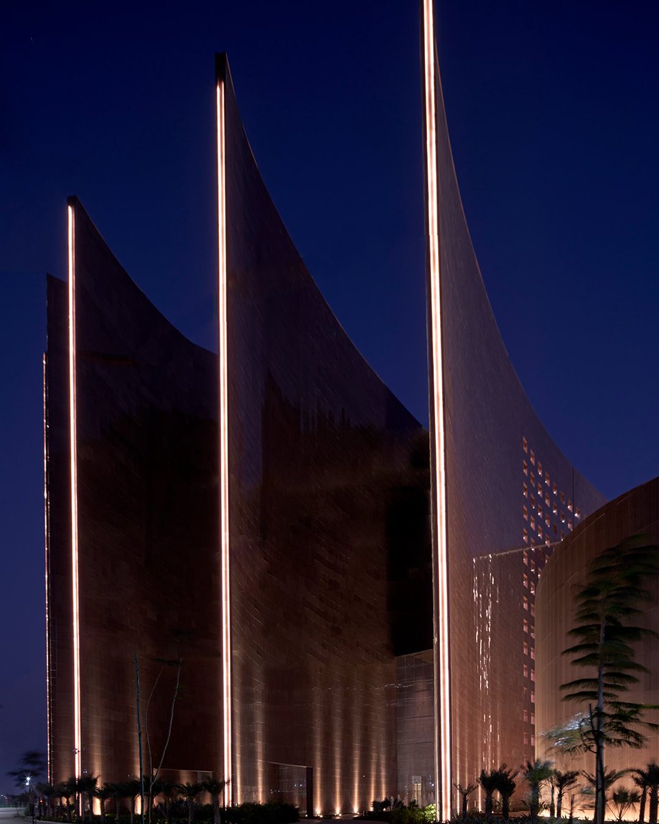 At the Surat Diamond Bourse, vertical fins are more than just a visual statement—they’re a passive cooling solution.
 
The Venturi and stack effects created by these fins result in an incredible 30% of the building's total area being naturally ventilated and passively cooled.