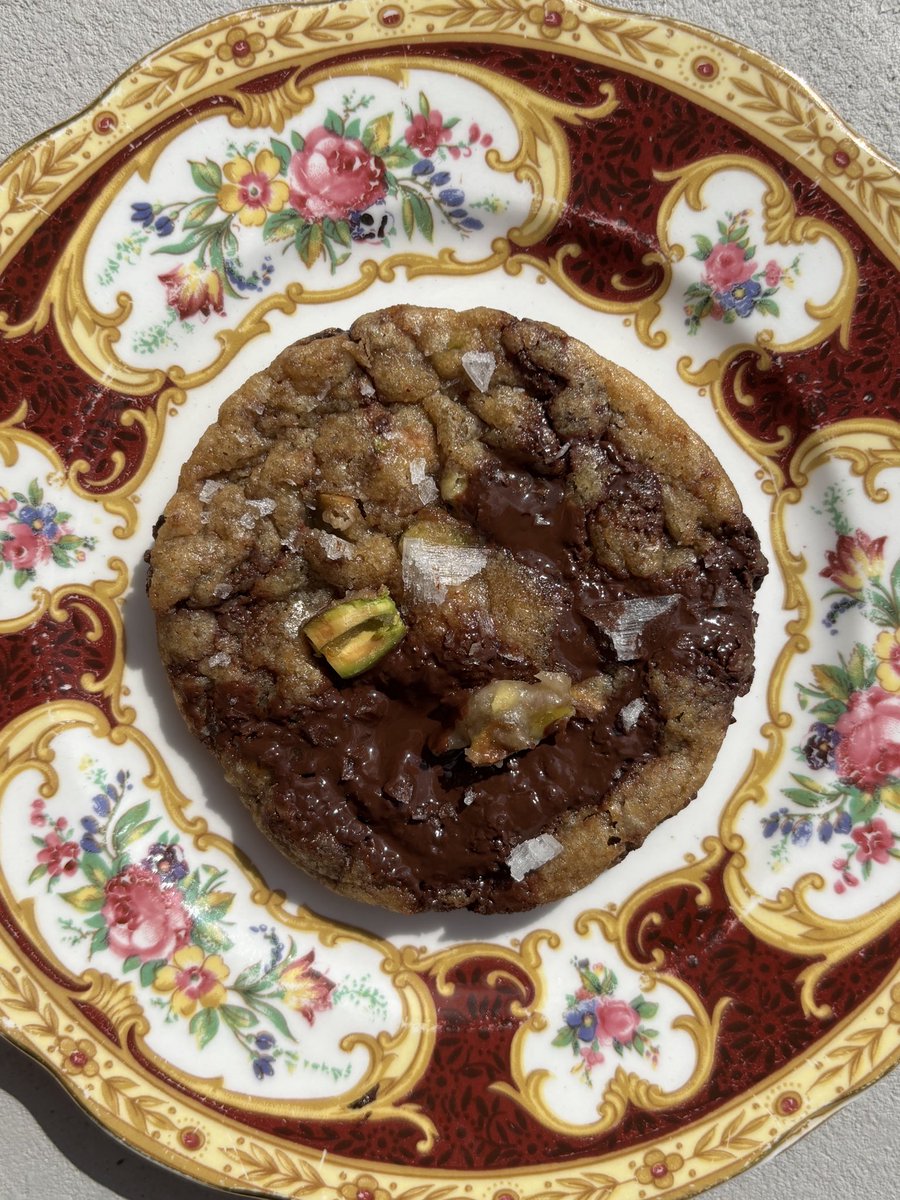 bakingenjoyer's tweet image. brown butter, dark chocolate and pistachio praline cookies with flakey sea salt &lt;3