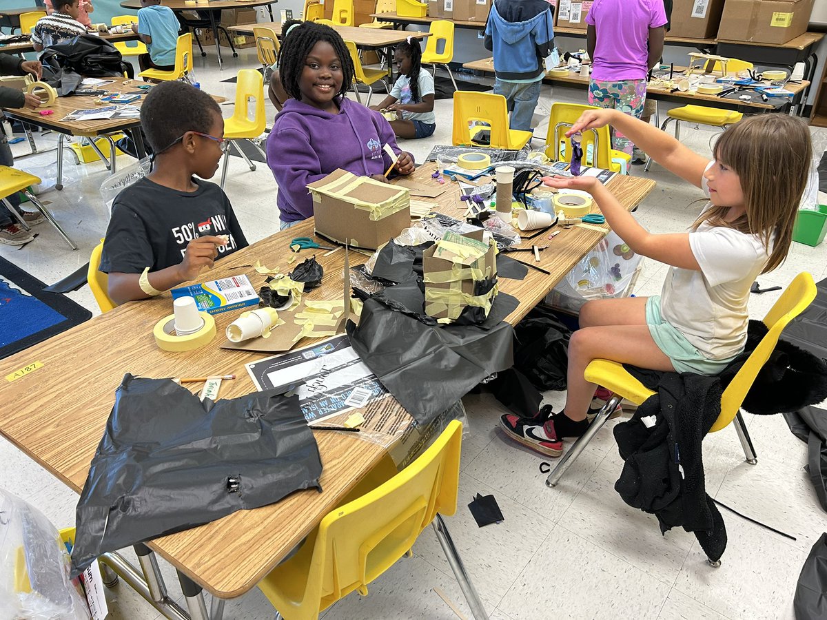 🏝️ Our young explorers at Title I Camp HB3 are hard at work! 💪 They're building shelters to protect the characters they created on Archaic Island as they search for pieces of Professor Ivana Dig-it’s note to uncover the lost treasure! 🧭 📜#ArchaicIsland #CreativeLearning 🏕️