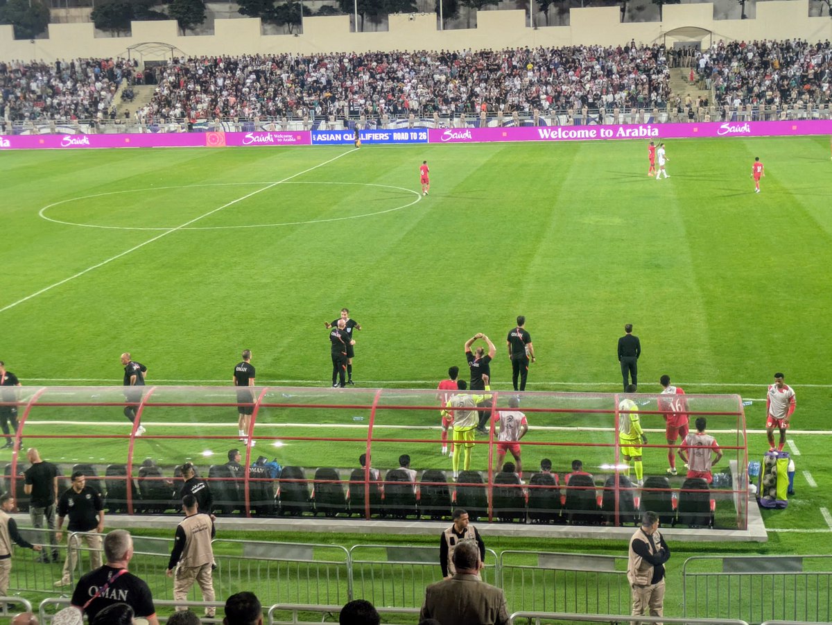 Oman bench demanding a 90th minute penalty. It's getting tense