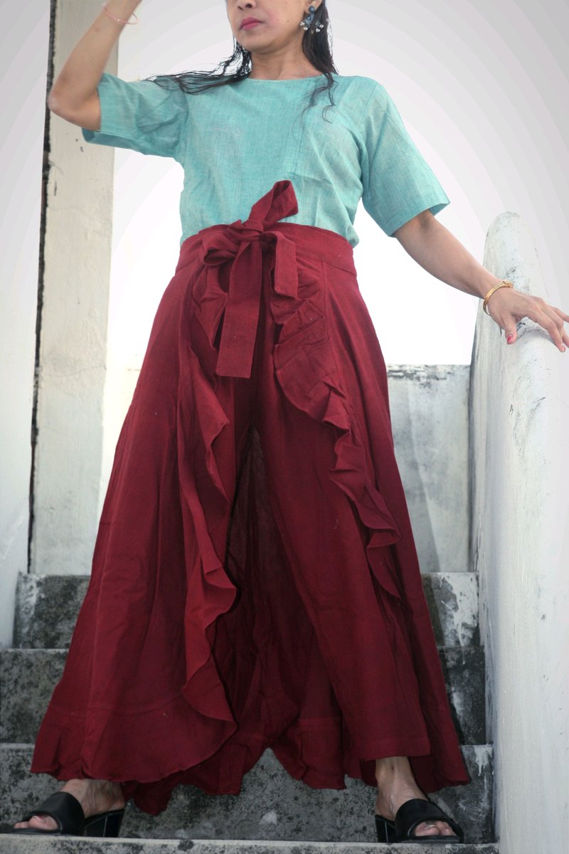 rangamaati's tweet photo. Step out in elegance with the KALEIDOS maroon wrap-on skirt palazzo. 🌟 A sustainable fashion statement, featuring a flattering asymmetric flared hem and breathable design. Look good, feel great. #SustainableStyle #FashionWithPurpose #EcoChic https://t.co/XbUx84PquZ