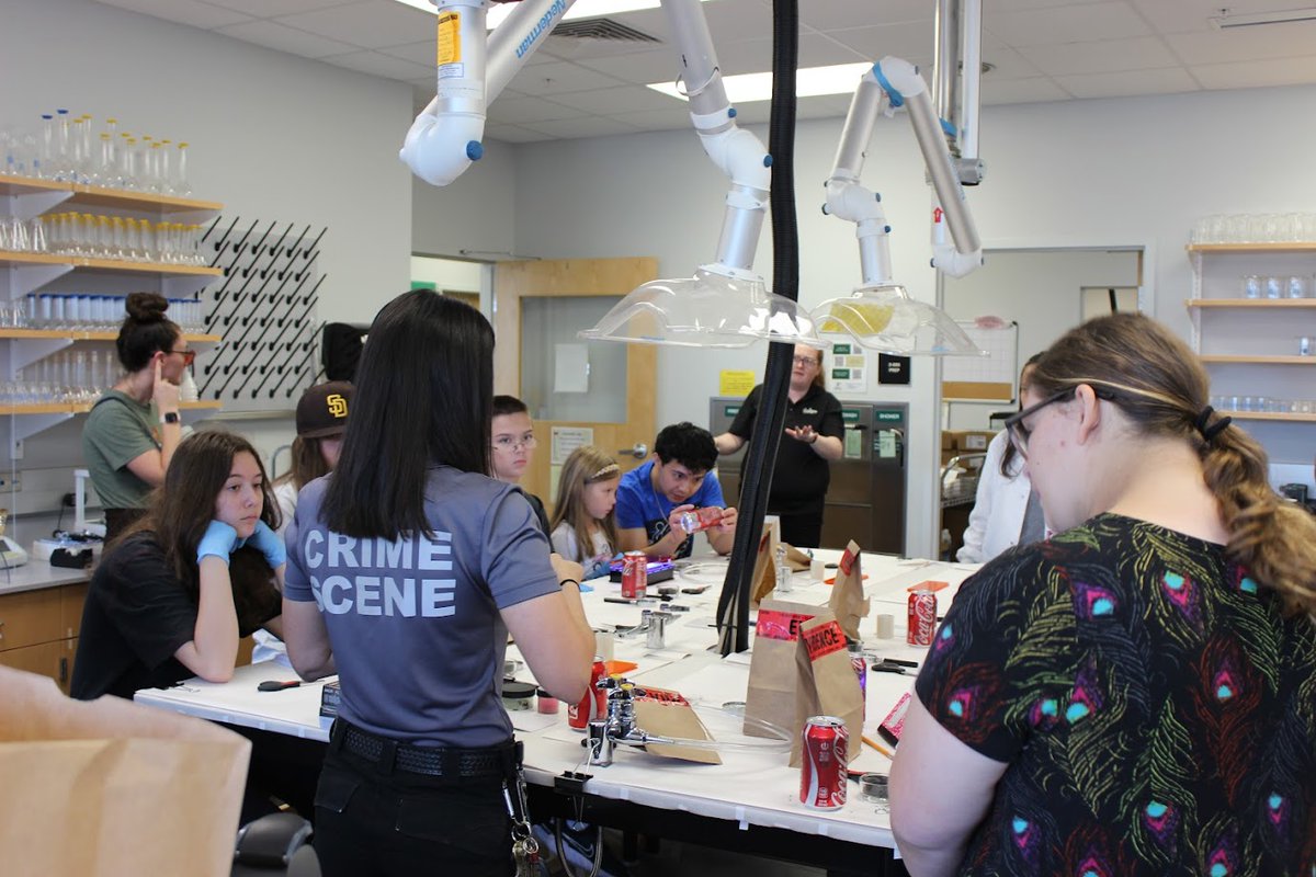 USF students made forensic science accessible for all at "Fur-ensics: A Canine Crime Scene Investigation." Middle and high schoolers solved the mystery of "Destruction at the Dog Park" while Communication Sciences students provided ASL interpreting.