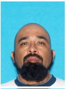 Elipidio Reyna, 40, of Compton, is charged with assault on a federal officer. Reyna threw rocks and improvised explosives at federal officers in their vehicles. He faces up to eight years in prison. The FBI is offering a $50,000 reward for information leading to his capture.