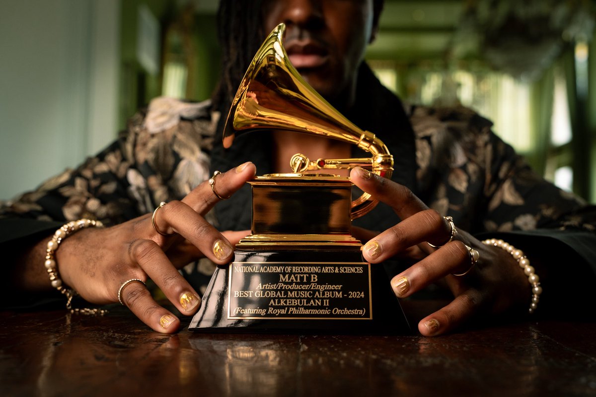 thought a hater said sumn… settling into my GRAMMY winning era. just a preview of what’s to come 🔥

📸: @awskaritoo 
Edit: <a href="/angelavbenson/">Angela V. Benson</a> 
Drip: <a href="/Roberto_Cavalli/">Roberto Cavalli</a> 
Jewelry: <a href="/gucci/">gucci</a> 
Tailor: @madisonjmcfarland 
Nails: @_ayunails 
Styling: <a href="/angelavbenson/">Angela V. Benson</a> @ry_gg_guy 
Cigar: