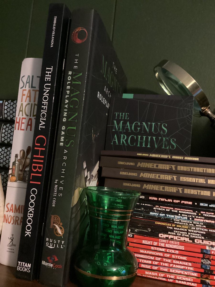 Fixed my shelving situation so now my Magnus dice and Magnus rp book are next to each other :)