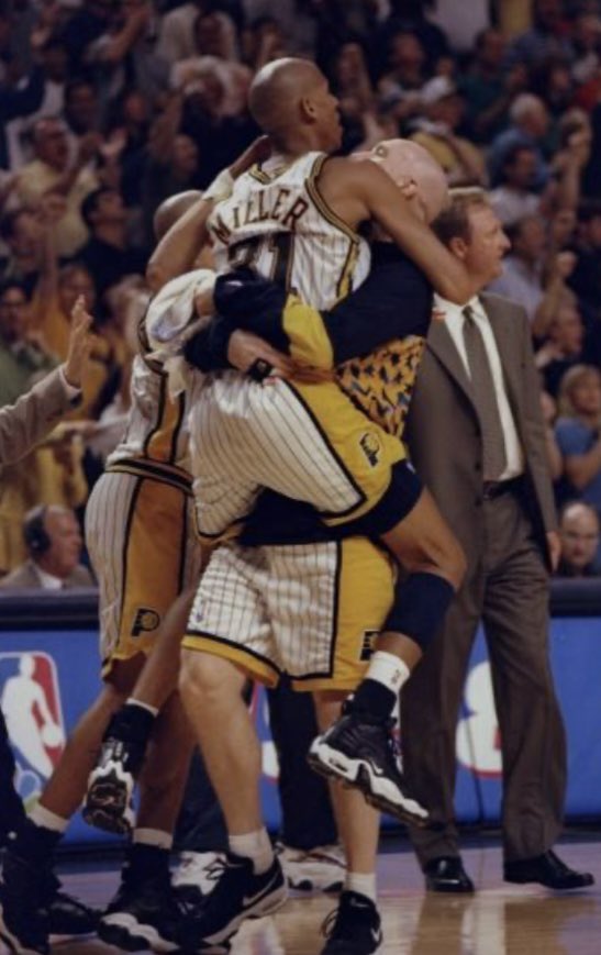 HarryHaris48861's tweet image. Reggie Miller hugs Indiana Pacers teammate Chris Mullin to celebrate a playoff victory, coach Larry Bird in the background. #ReggieMiller #ChrisMullin #LarryBird #IndianaPacers #YesCers #Indiana #Pacers #basketball 🏀