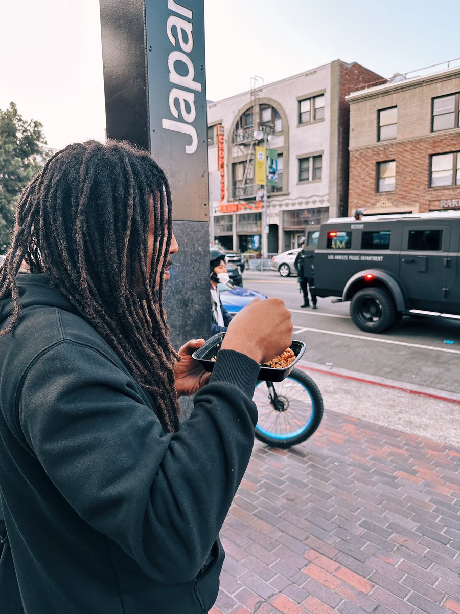 Shout out this dude casually eating fried rice while 12 were shooting rubber bullets and flash bangs to push protesters down 1st street