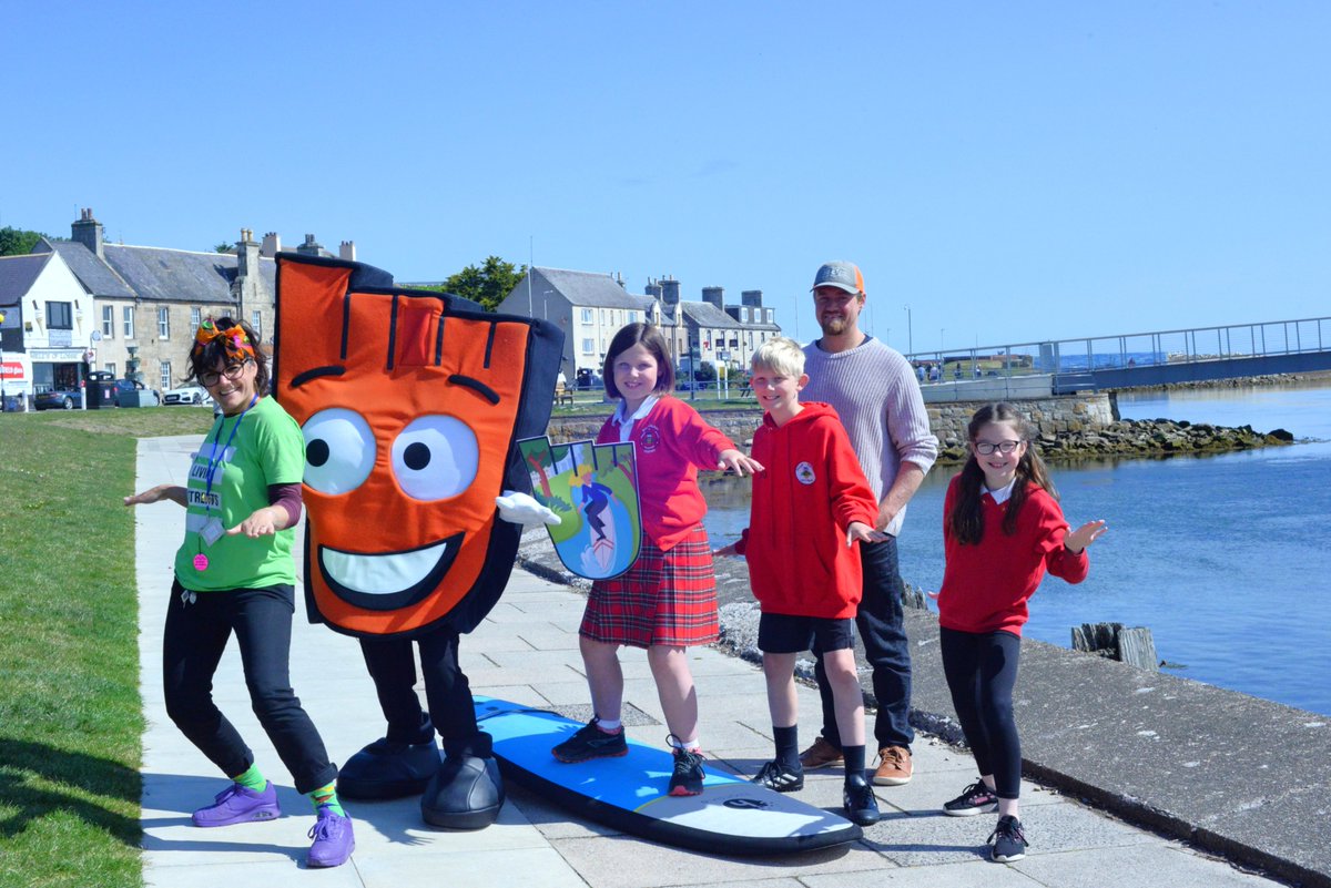 We're so excited about this months WOW badge! 🏄‍♀️
Designed by Anna at  @mosstodlochPS , the surf-themed badge will be awarded for active travel in June.
 
Thank You to  <a href="/NewWaveSurfSch2/">New Wave Surf School</a>  in Lossiemouth, for gifting  Anna and two friends a surf lesson to celebrate! ✨