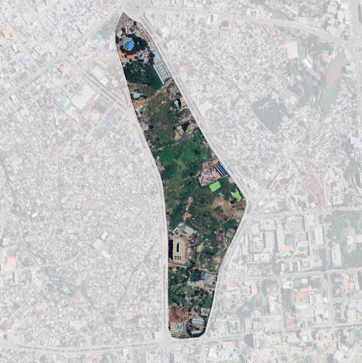 Behind Teklehaimnot Church lies a piece of land once full of life a neighborhood that housed thousands. Almost nine years ago those people were forced out displaced to make way for a once-promised expansion of Black Lion Hospital. Nearly a decade later what do we have? A single