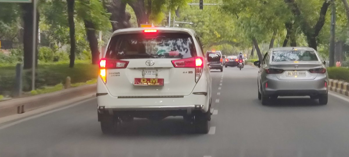 dpsddi's tweet photo. @dtptraffic 
Please see a vehicle on Shahjahan Road at about 6.25 PM on 11.06.2025. The vehicle has written DM New Delhi on the backside number plate. No registration number.
It needs to be penalized.
Would appreciate, if the action taken in the matter is informed in the trail. https://t.co/gG8btACTqg