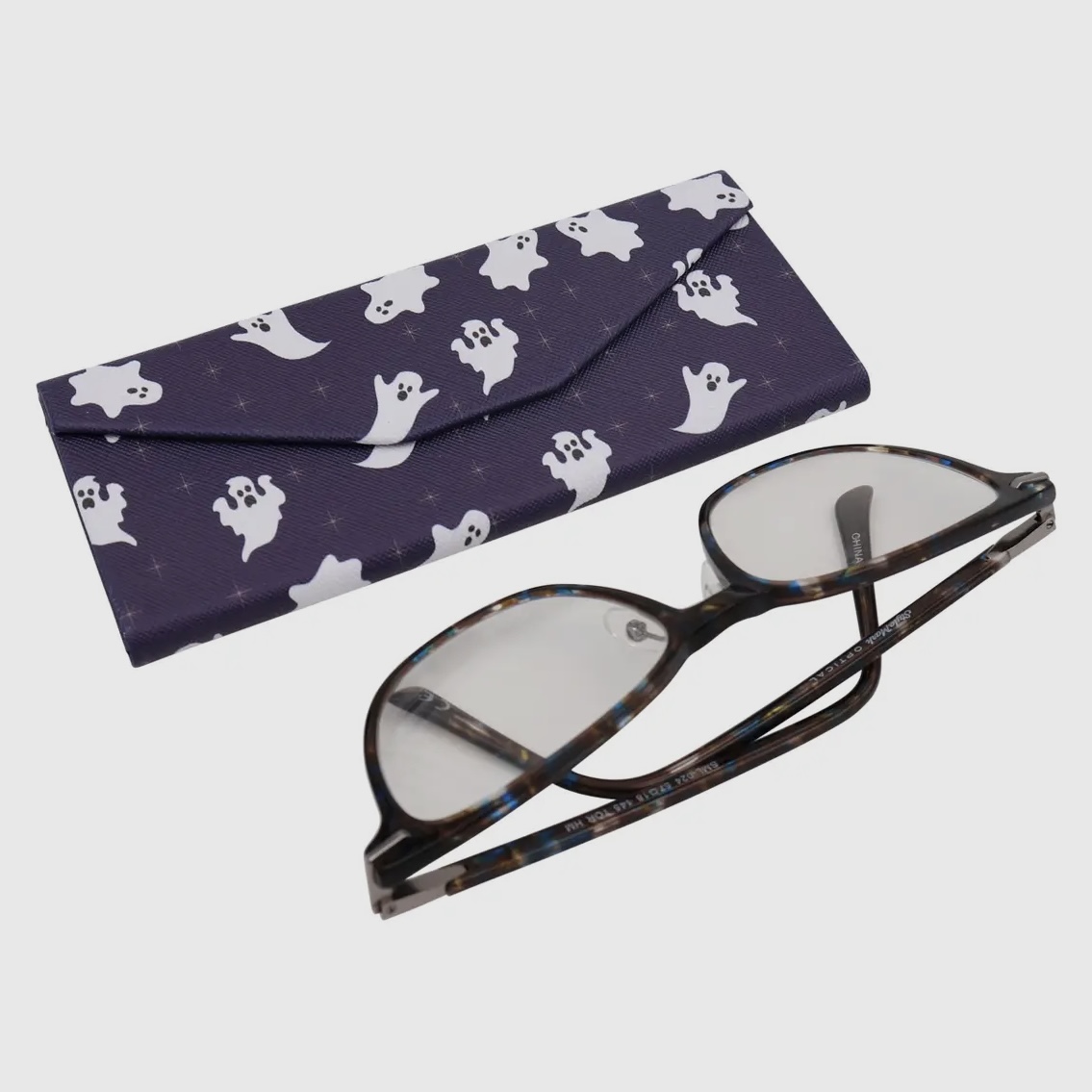Elevate your eyewear game with our collection of spooky magnetic folding glasses cases! Crafted from durable eco-leather with a sturdy aluminum and cardboard core, each case fits most sunglasses and glasses, folding neatly for easy storage! For more info: wickedlywilliams.com/search?q=glass…