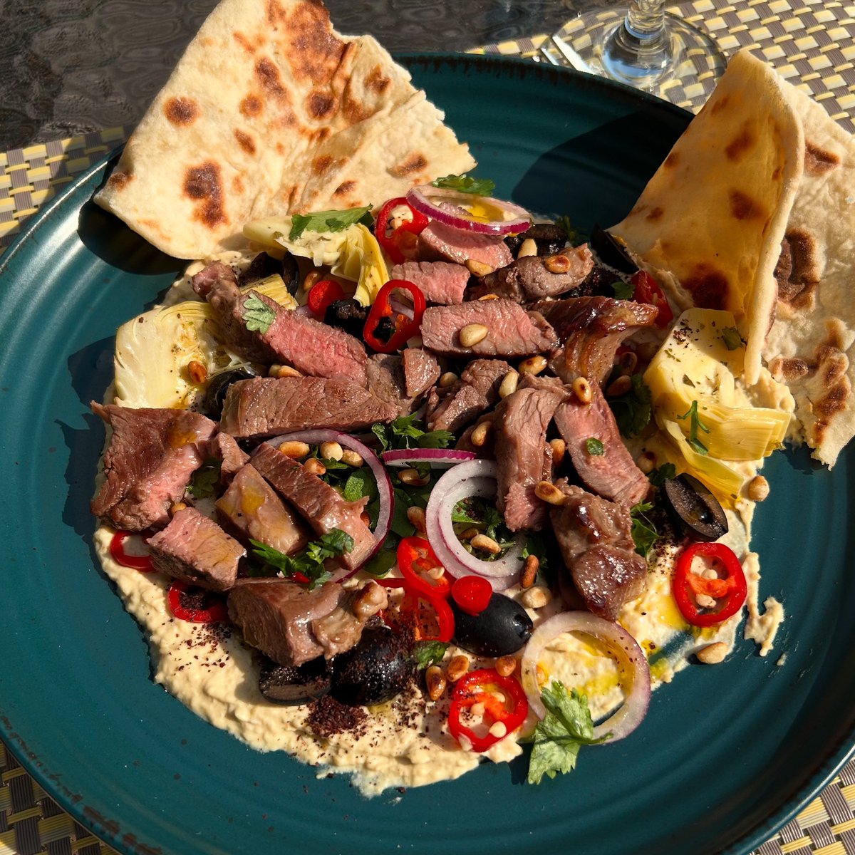Lamb hummus artichokes black olives chilli red onion toasted pine nuts sumac coriander flatbreads 😋
That’s the post &amp; beautiful out in the garden too 🌞