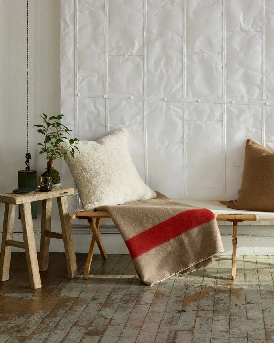 A timeless antique stool made from Vintage Elmwood, handcrafted in China using traditional joinery.