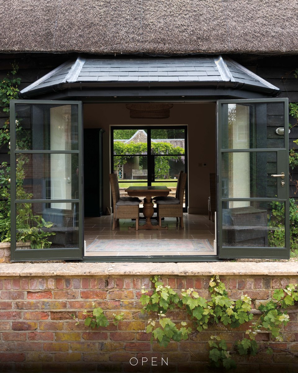 This charming English cottage gets a modern twist with our OB-36+ Soho French Doors — rethinking the entrance with sleek lines, bold glazing, and timeless elegance. The perfect balance of contemporary style and countryside character. Modern meets cottagecore… and it just works
