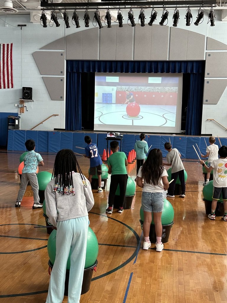 Drum Fit is happening at the John. F. Kennedy Primary School. The students in health and physical education classes exercise through percussion movements and music, a great cross-curricular activity.