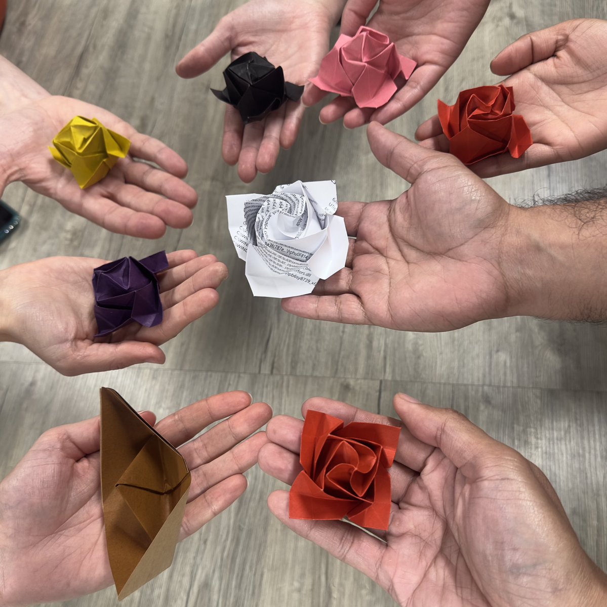 UTGeripal's tweet image. Our last #wellness session with the fellows! We braved creating a complex origami of a rose in bloom to signify their completion of training as budding #geriatrics and #hpm physicians! @RexPaulinoMD @nuzhaamjad1