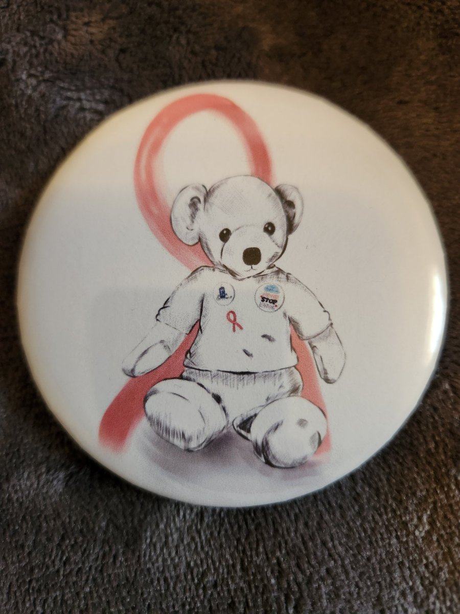 A certain someone made us a big batch of badges. Including various cancer awareness designs. Including these three teddy bear drawings we have collected. The first one of which is the image on Girl's GFM fundraiser. #TheHugHouse