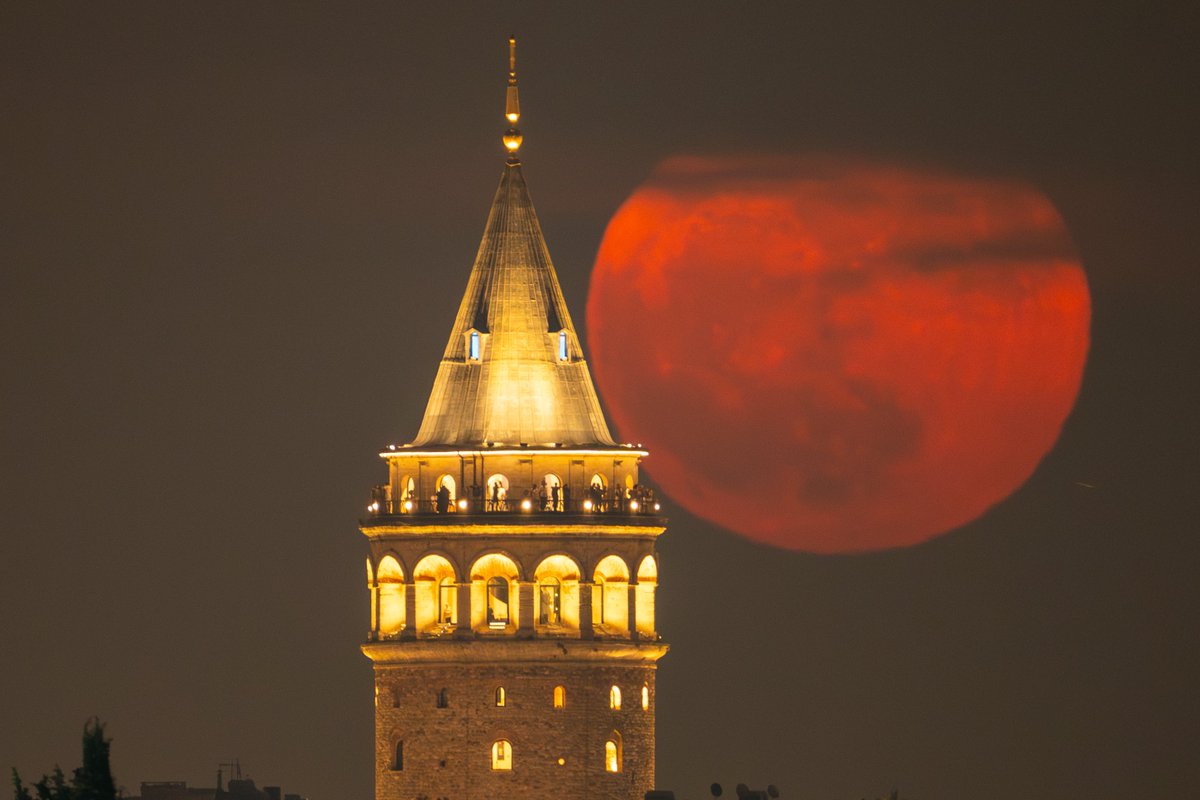 gurel_emrah's tweet photo. A full moon rises behind Galata Tower landmark in Istanbul, Turkey, Wednesday, June 11, 2025. (AP Photo/Emrah Gurel) https://t.co/hP5sAOXVJf