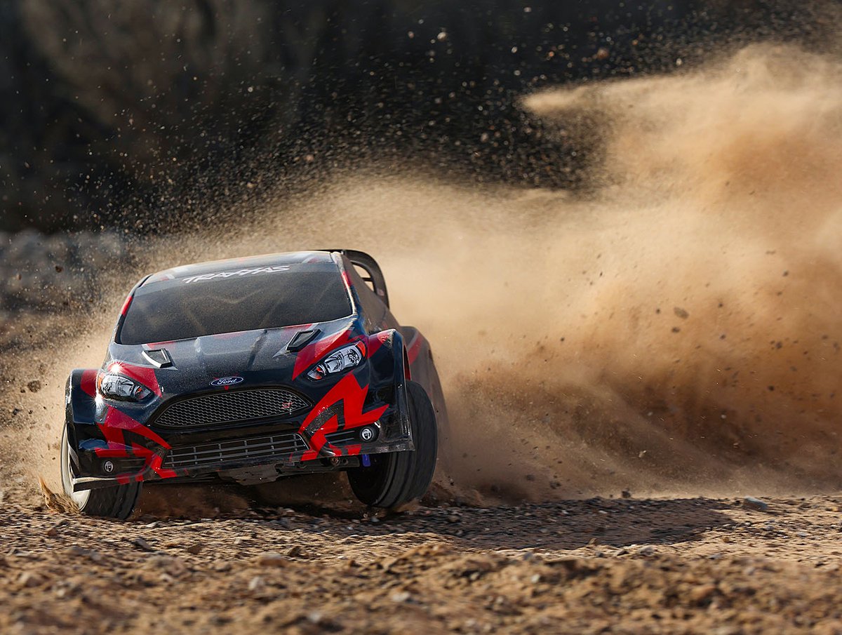 Traxxas's tweet photo. Coming in HOT. 🔥
Grab a #Traxxas Ford Fiesta ST Rally and throw it sideways! 😤 
https://t.co/azUsrg1TgO

[[Model # 74154-4]] #TraxxasRally #FordRally #FiestaST #RC #FastestNameInRadioControl https://t.co/KwYDs57Kdz