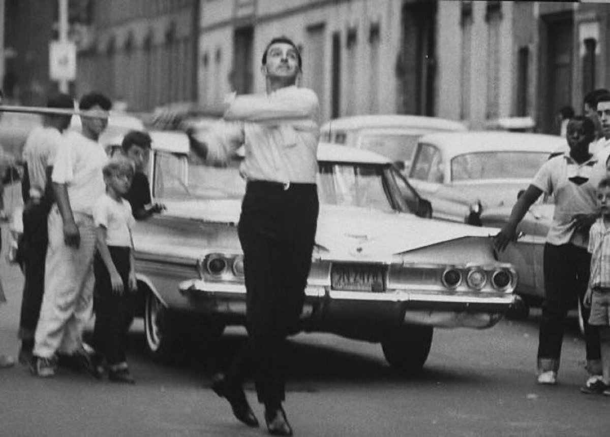 sigg20's tweet photo. “Old Days”Yankees Star,Joe Pepitone does his best Willie Mays impersonation,playing stickball in his old Brooklyn neighborhood in the early 1960s.#Yankees #NYC #1960s #MLB #stickball https://t.co/leh5ubYpJV