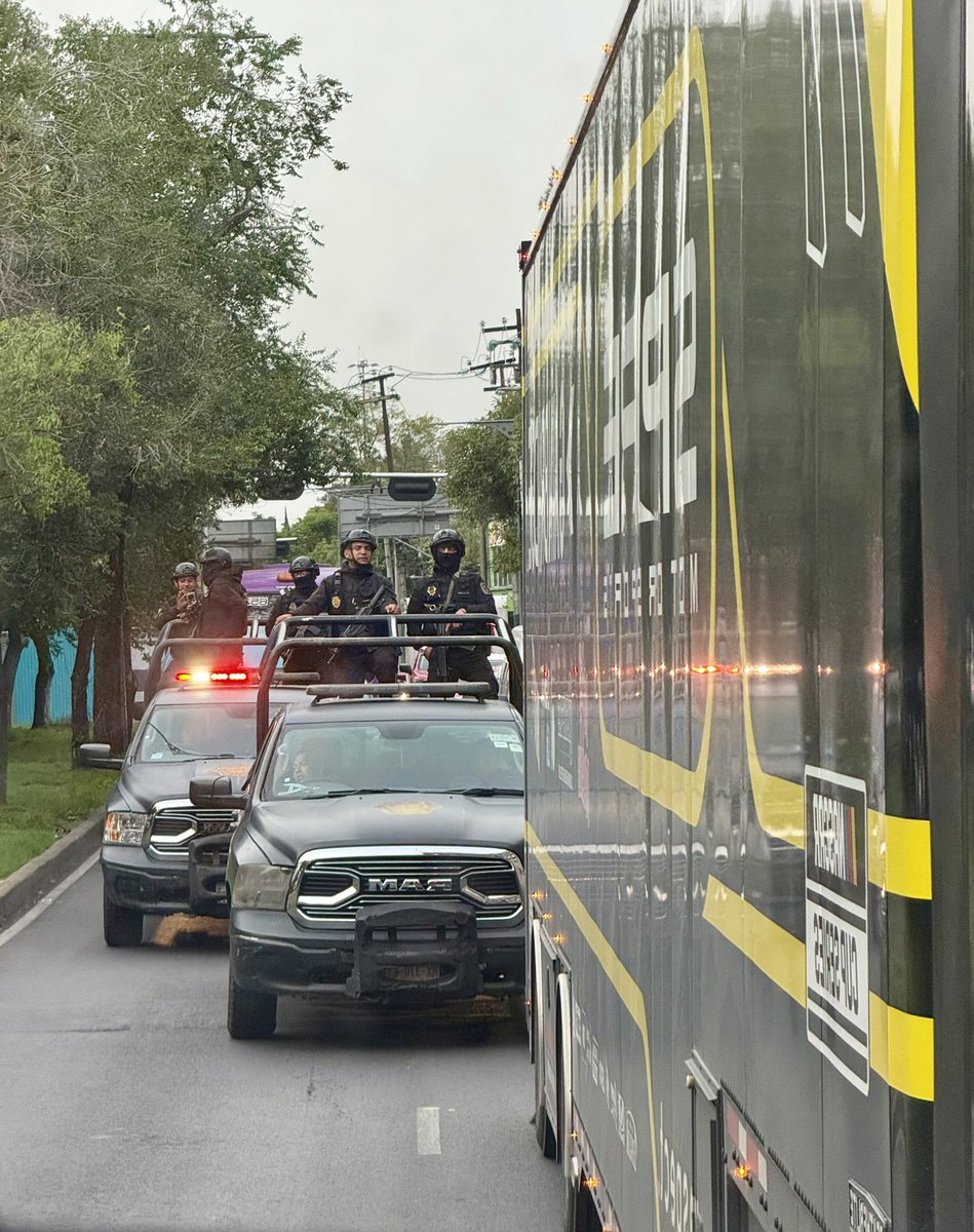 Armed escorts for Nascar haulers heading into Mexico.