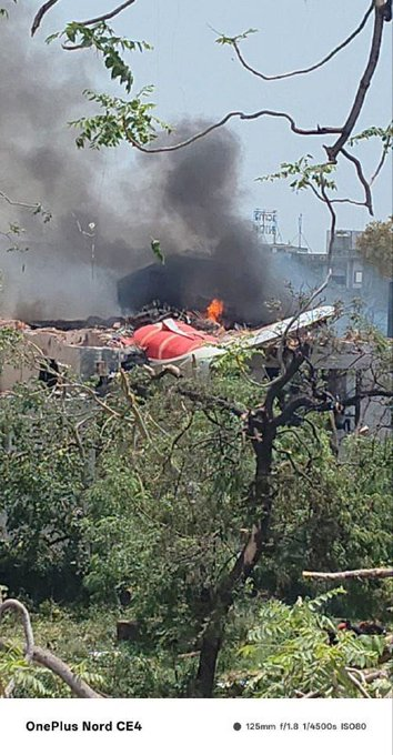 FIRST PHOTO: Air India Flight 171, a Boeing 787 Dreamliner operating on the Ahmedabad to London route, crashed in a residential area near Ahmedabad Airport. The aircraft was carrying at least 242 people on board.