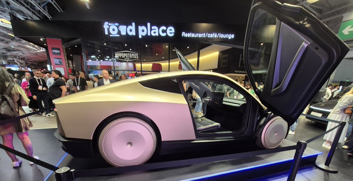 Trying the <a href="/Tesla/">Tesla</a> Y model <a href="/VivaTech/">VivaTech</a> 
#iLovetheGoldOne