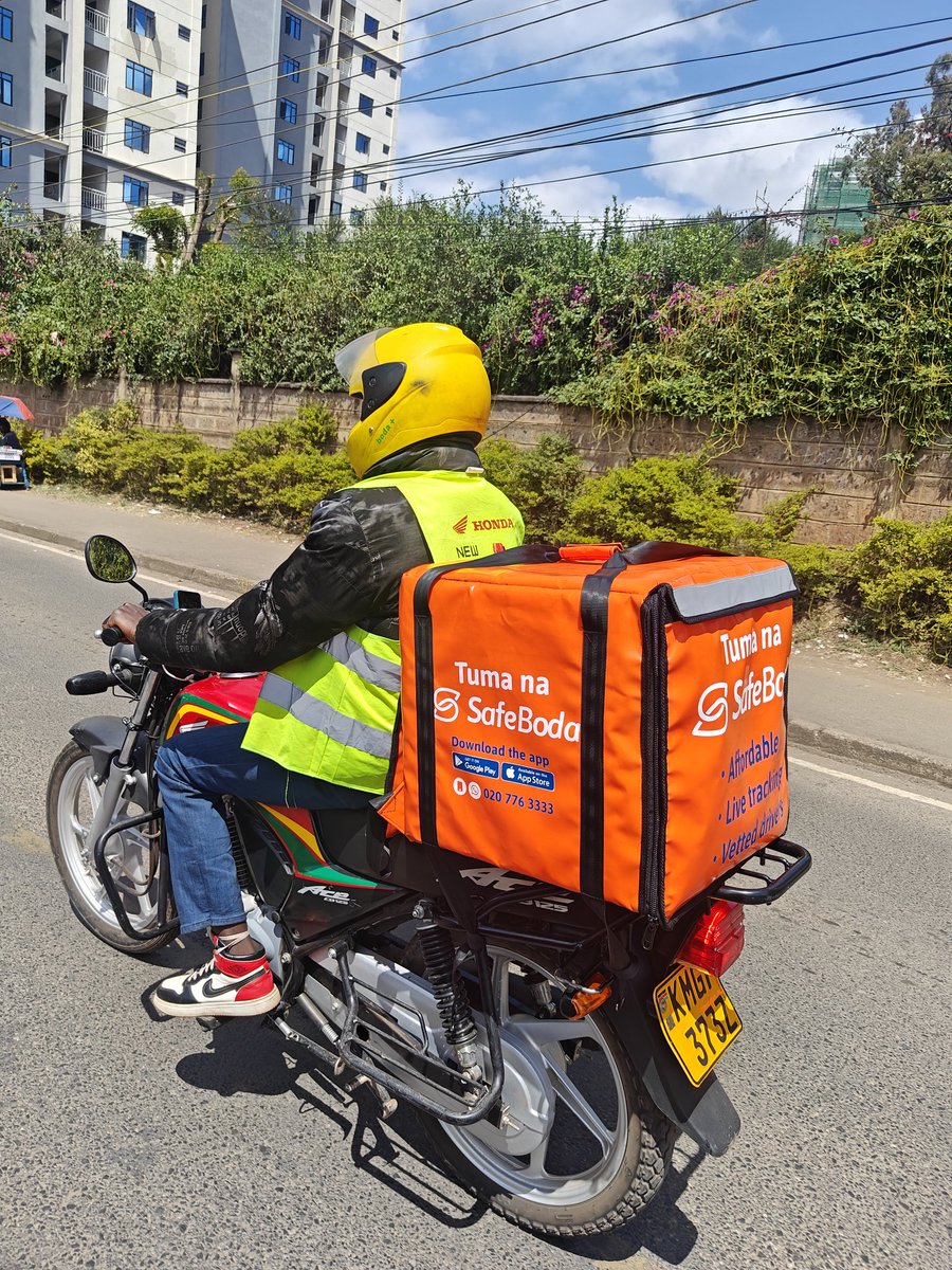 SafeBoda_Kenya's tweet photo. You asked, we delivered (literally)ay hello to our brand new bags used by our riders💃.
📌More secure
📌More professional 
📌Easier Rider recognition 

Spot a rider with a new bag? Give them a shout out 😌

#TumanaSafeBoda https://t.co/ZFvijrfpcv