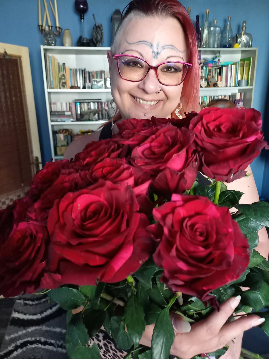 21st Wedding Anniversary! 
The best days of my life were when I met Tommy, when he asked me to marry him and when we got married. These 21 red roses that Tommy gave me symbolize our 21 years of marriage! We wish you all peace, love, and happiness in this crazy world!