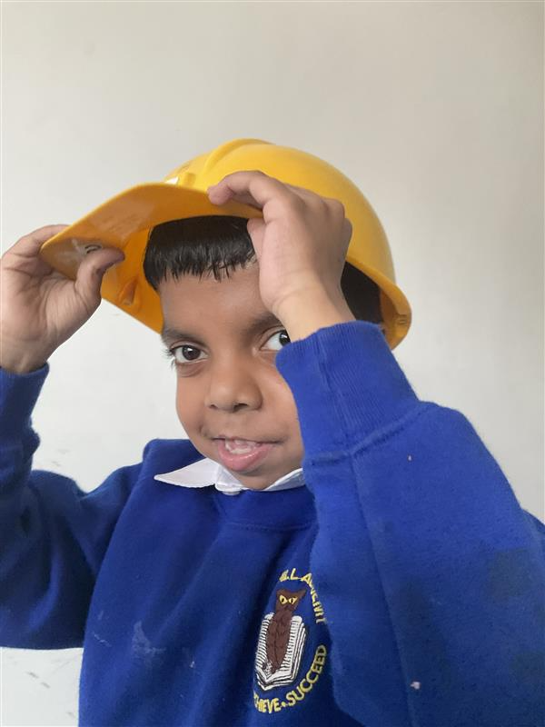 This week in topic we have been looking at builders.
Rainbow room have used their fine motor skills to build and draw shapes of buildings. 
Sunshine room have been using their art skills to imitate Paul Klee’s painting of a castle.  They have also continued to build their car.