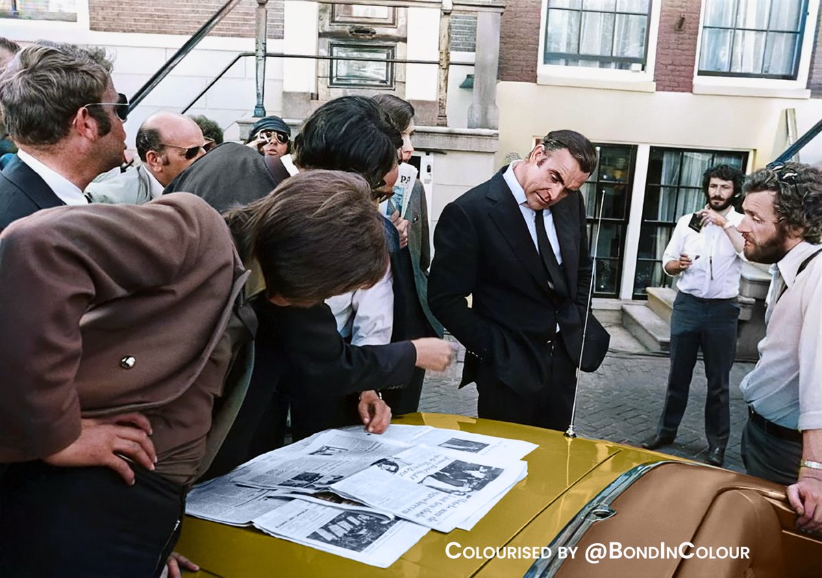 BondinColour's tweet image. Behind the scenes in Amsterdam for Diamonds are Forever. The paper looks Dutch, though not sure what they’re reading - maybe it’s about Bond being in town! #jamesbond  #seanconnery   #diamondsareforever #colourised #colourized