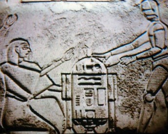 Also in the Well of Souls, you can see a golden pillar with a tiny engraving of R2-D2 and C-3PO from Star Wars. They are also on the wall behind Indy when he first approaches the Ark.

26/36
