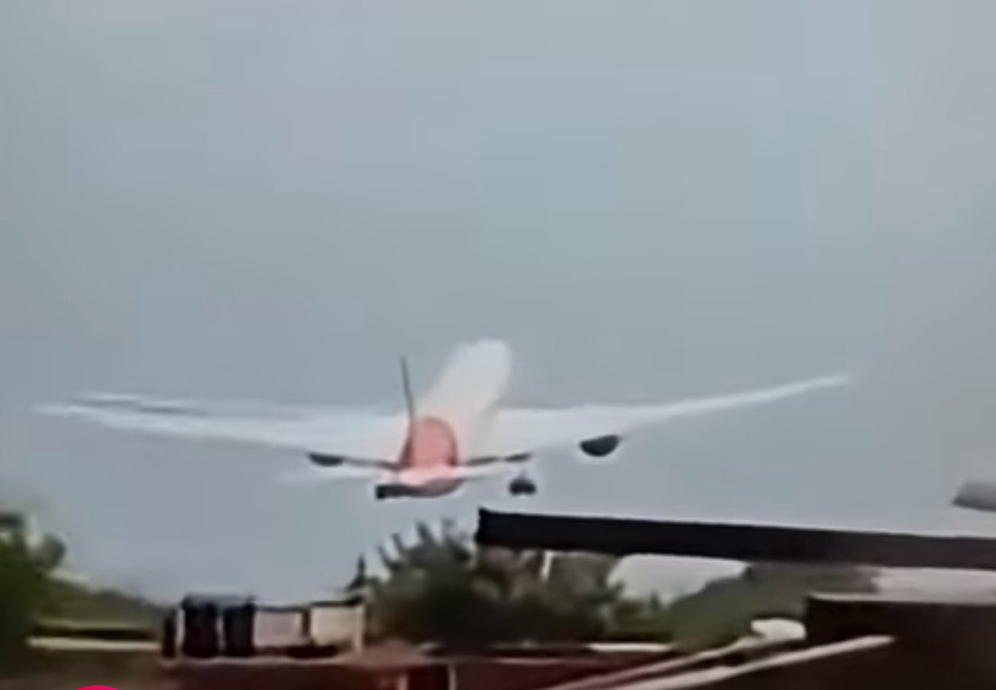 ManojNalanagula's tweet photo. Artificial Intelligence Visual Observations – Few Seconds Before the Crash

1. Landing Gear Still Extended
•The landing gear has not been retracted, indicating:
•The aircraft remained at low altitude after takeoff.
•The crew possibly encountered a problem before reaching gear retraction altitude (~400 ft AGL).
•A gear-up delay is a red flag during standard departure procedures.

⸻

2. High Nose-Up Pitch
•The aircraft’s nose is tilted significantly upward.
•This could indicate:
•An attempt to gain altitude rapidly (possibly due to an emergency).
•A possible departure stall scenario, where the nose is too high and airspeed is too low for stable lift.

⸻

3. Wings Show Slight Roll/Bank
•The aircraft is not level—there’s a slight asymmetric bank (possibly right-wing low).
•Possible interpretations:
•Uneven engine thrust, suggesting partial or complete engine failure on one side.
•Pilot input to stabilize the aircraft, possibly due to yaw or crosswind drift.

⸻

4. No Visible Thrust or Exhaust Trails
•Normally, at takeoff power, modern jet engines show mild heat distortion or contrails.
•In this image:
•There is no visible exhaust, which could imply low engine output, engine flameout, or a power system failure.

⸻

5. Altitude Appears Low Relative to Climb Profile
•Judging by the haze and the proximity to the ground, the aircraft seems below expected climb-out altitude.
•It may have failed to gain safe altitude, consistent with a takeoff stall or thrust loss event.