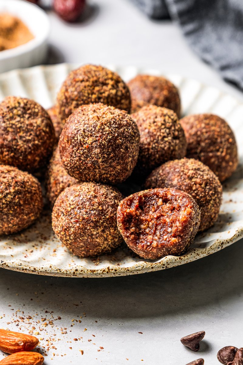 These easy no-bake energy balls are the perfect on-the-go snack packed with juicy dates, raw almonds, chocolate, and nut butter. #breakfast #energy  diethood.com/energy-balls/