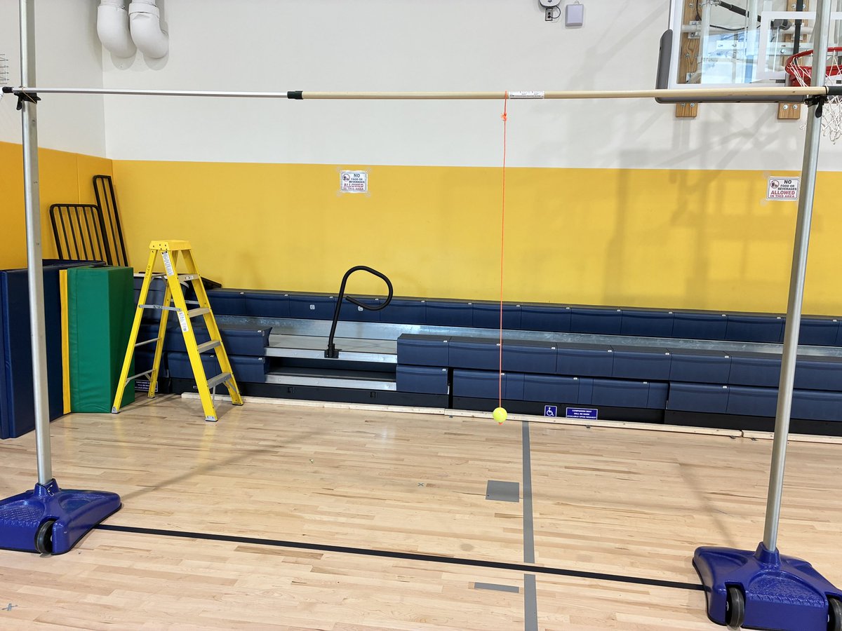 Batting station using a tennis ball that I drilled through, washers to prevent cord from sliding out, and loop around pole so it rotates around without wrapping around. 

1 time around=single…

…5 times around=grand slam. 

No one has hit a 6 yet. 

#physed