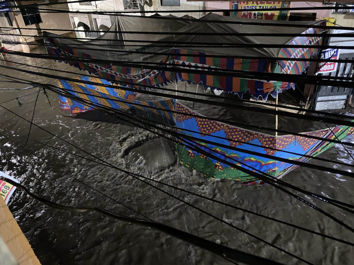SQMasood's tweet photo. Macca Colony Nala has become more painful after the recent construction. Last night, just 5 minutes of rain caused the entire lane to flood. Due to the mud, people were unable to walk &amp; this has become a regular issue for us. 

@CommissionrGHMC should take serious note of this. https://t.co/fGf7fVCEiZ