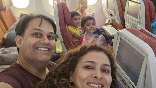DrMann1995's tweet photo. A doctor Couple with their children . This photo, full of smiles and anticipation, was taken just before the Air India Express crash. A heartbreaking reminder of how unpredictable life is. Cherish your loved ones—every moment counts. 💔🕊️ #AirIndiaExpress #LifeIsUnpredictable https://t.co/ELijYKHnJb