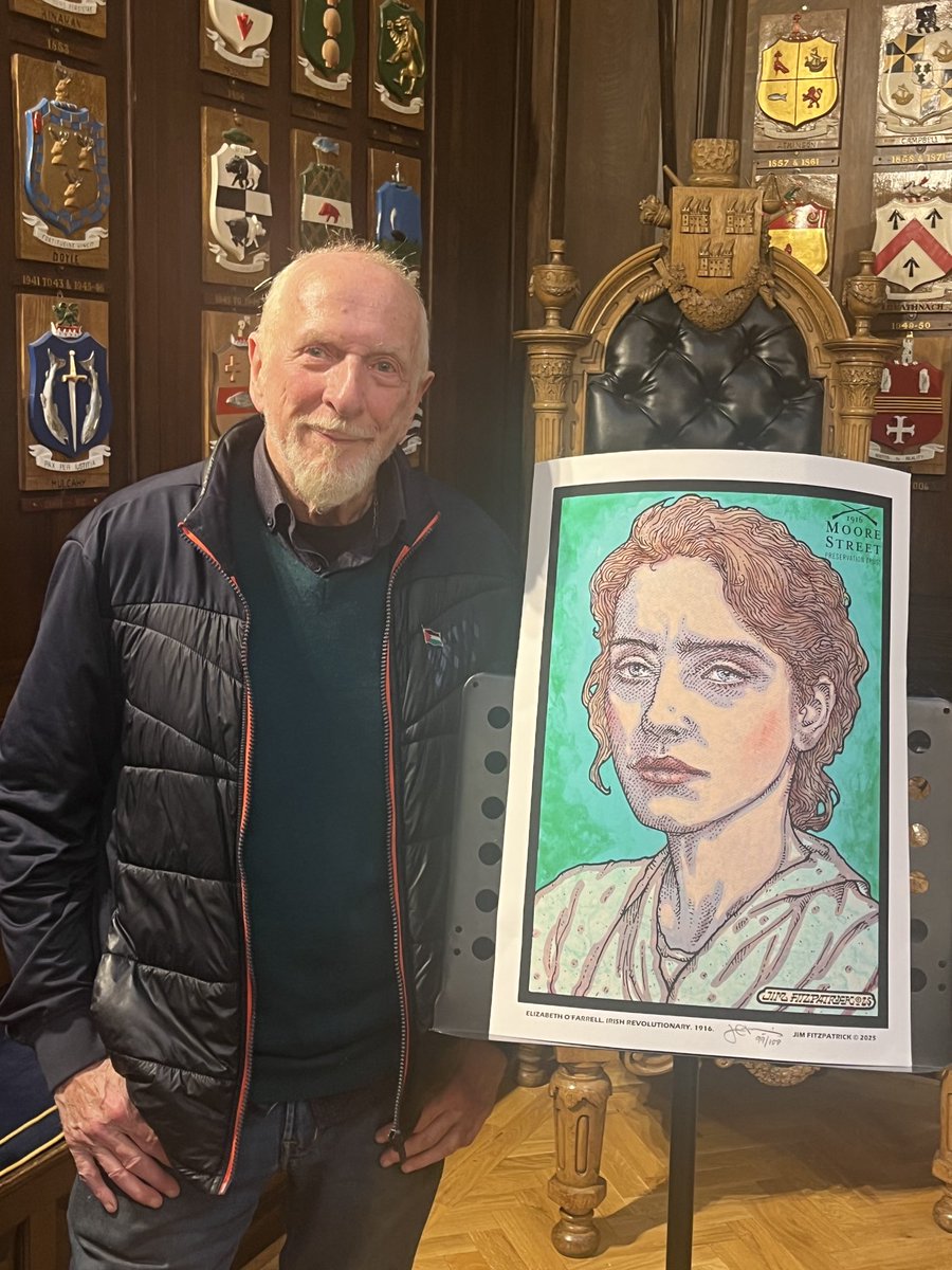 Renowned Artist Jim Fitzpatrick with his portriat of Elizabeth O Farrell at the Moore Street Preservation Trust launch of 100 limited edition prints in support of a 1916 Quarter on the battlefield site.