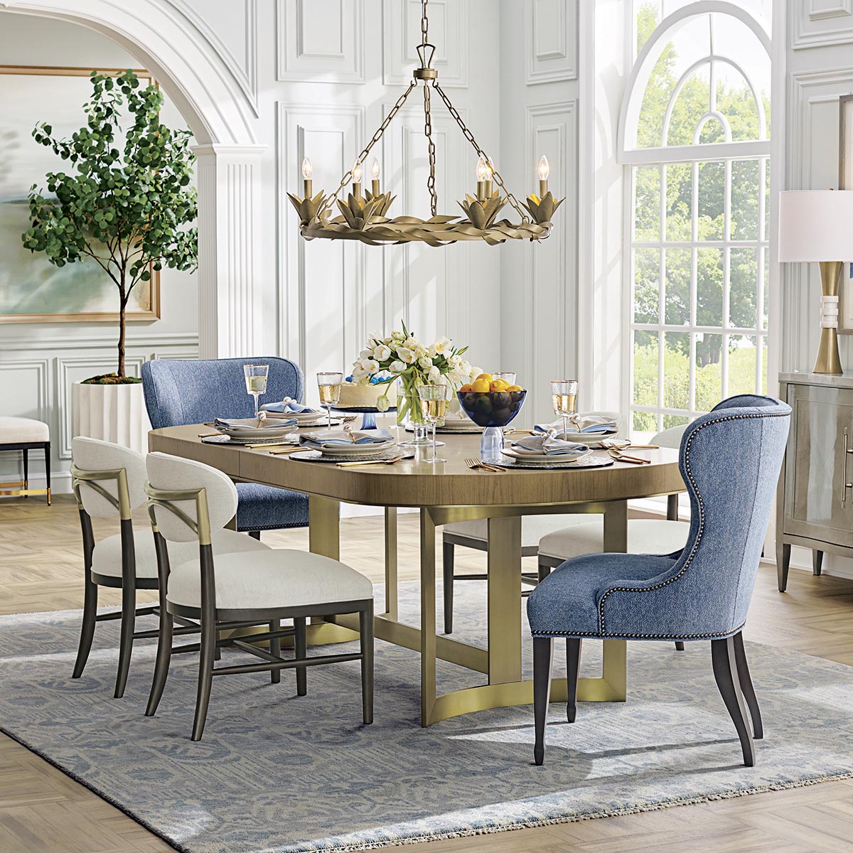 Frontgate's tweet image. Simply refined: A set of wingback chairs in a bright hue gives the dining room a fresh feel for summer. To get yours in time for the 4th of July, tap the link in our bio.
.
.
.
#frontgate #diningstyle #homeinspo #diningspace #tablesetting