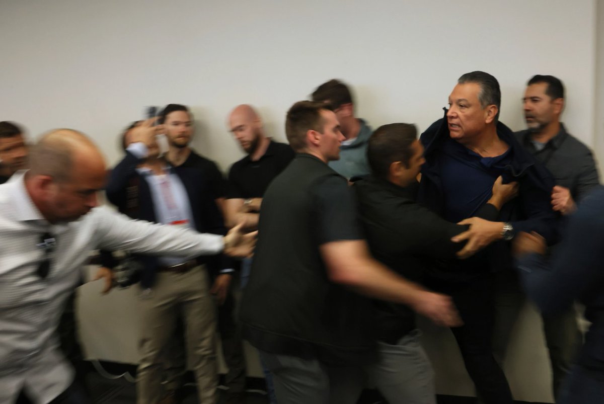 WFLA's tweet photo. Sen. Padilla is forcefully removed from Noem’s news conference on immigration raids and handcuffed https://t.co/71phwy92gA https://t.co/kWn52X59Z4