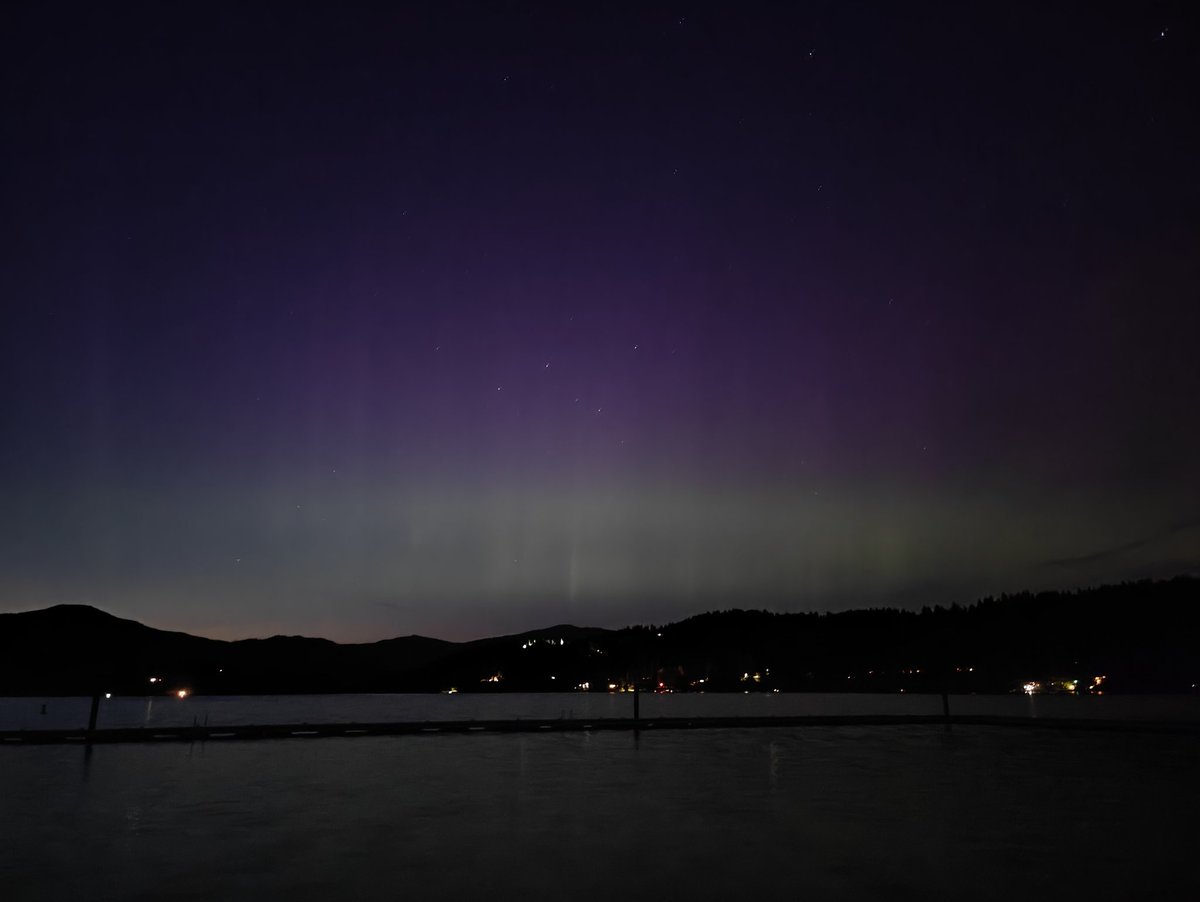 Not even fully dark yet and the Northern Lights are dancing above Hauser Lake in Northern Idaho.
