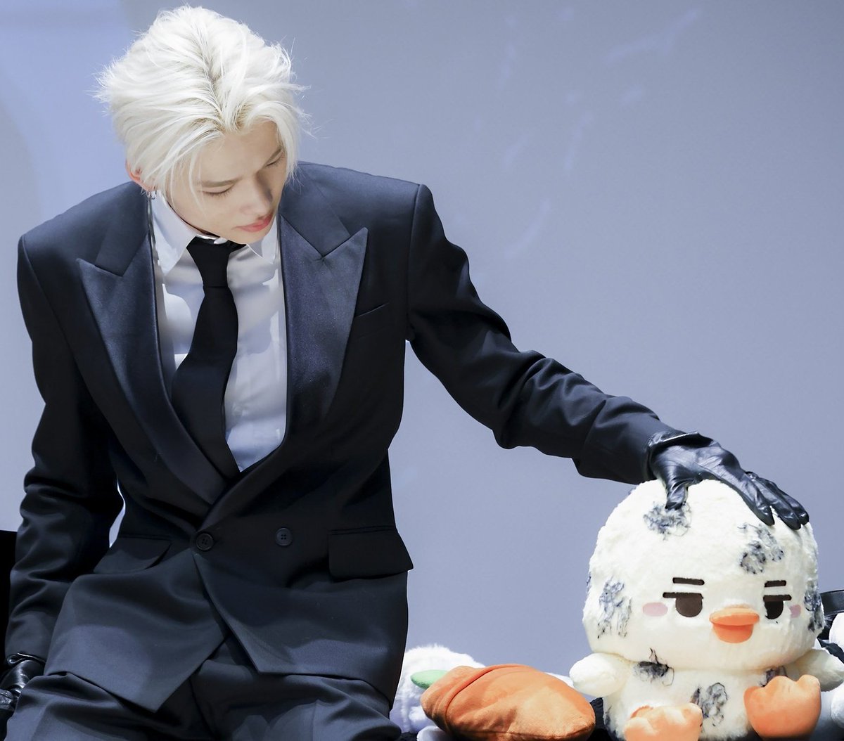 ni-ki patting his son's head